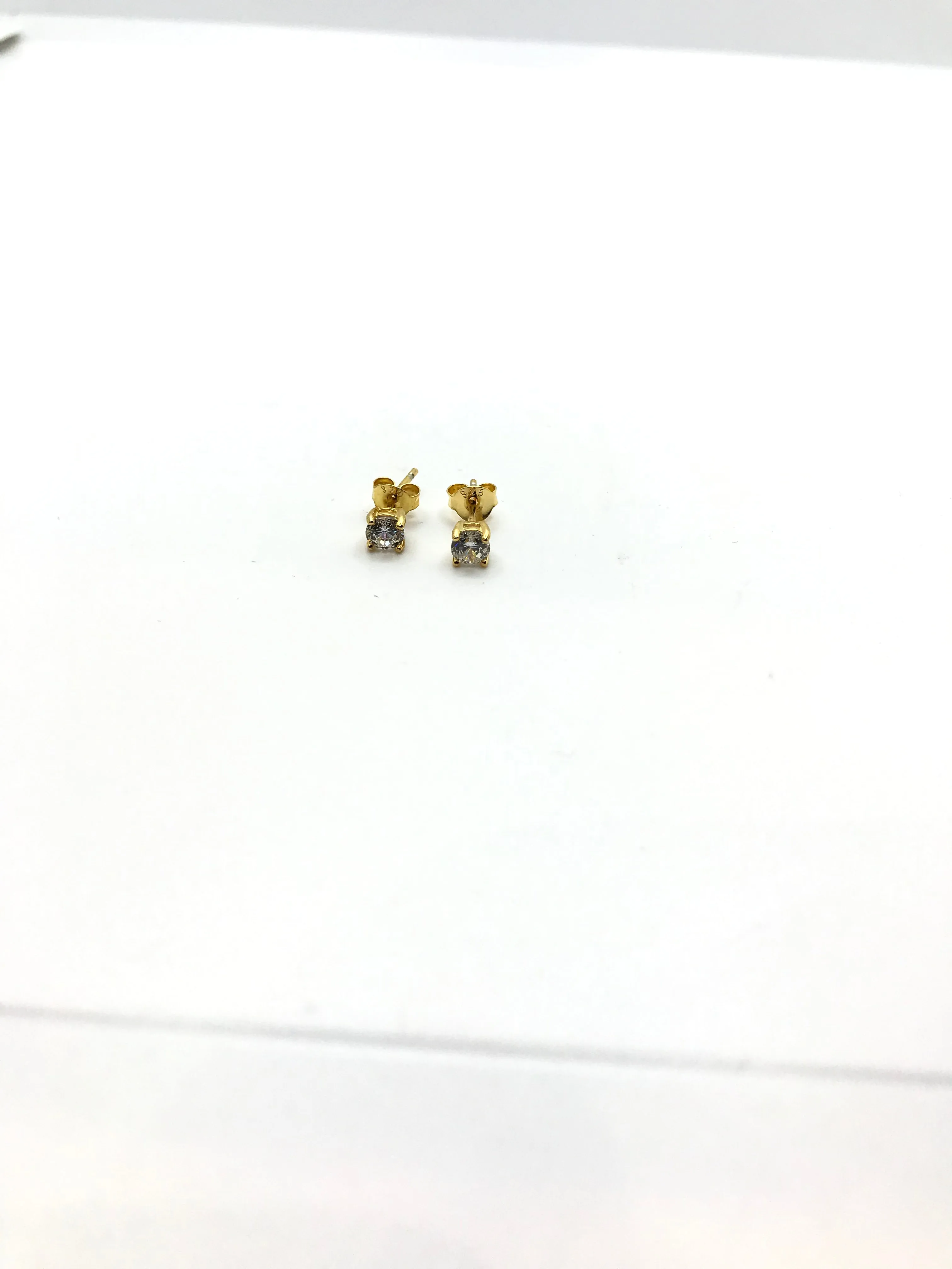 Sterling silver gold plated round studs